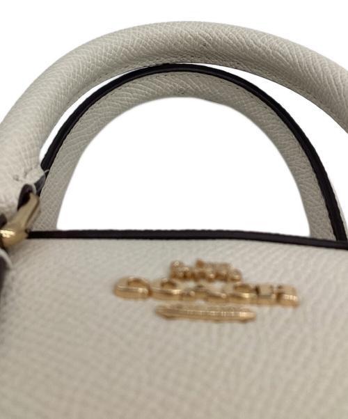 COACH（コーチ）COACH (コーチ) ミニローアンクロスボディ アイボリーの古着・服飾アイテム