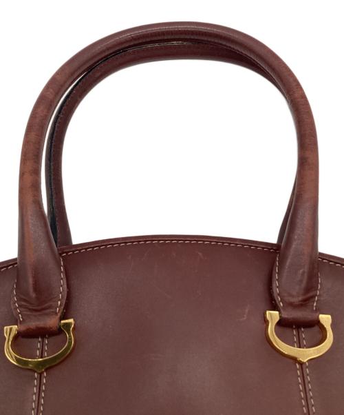 Cartier（カルティエ）Cartier (カルティエ) must de Cartier（マスト ドゥ カルティエ）ハンドバッグ ボルドーの古着・服飾アイテム