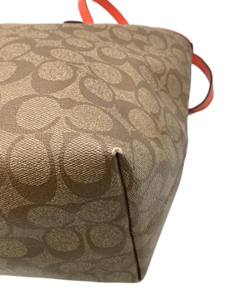 COACH（コーチ）COACH (コーチ) シグネチャー トートバッグ ベージュ×オレンジの古着・服飾アイテム