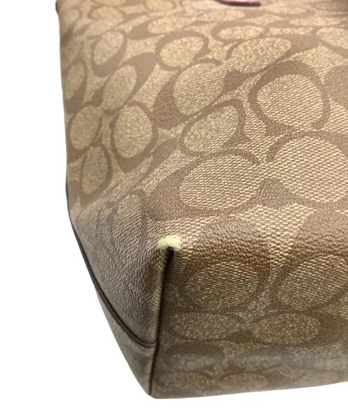 COACH（コーチ）COACH (コーチ) シグネチャー トートバッグ ベージュ×オレンジの古着・服飾アイテム