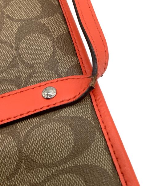 COACH（コーチ）COACH (コーチ) シグネチャー トートバッグ ベージュ×オレンジの古着・服飾アイテム