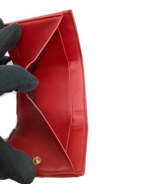 Saint Laurent Paris（サンローランパリ）Saint Laurent Paris (サンローランパリ) Vステッチ コンパクトウォレット レッドの古着・服飾アイテム