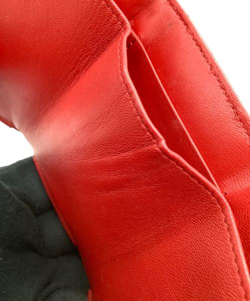 Saint Laurent Paris（サンローランパリ）Saint Laurent Paris (サンローランパリ) Vステッチ コンパクトウォレット レッドの古着・服飾アイテム