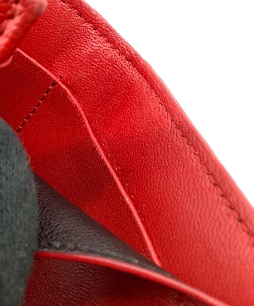 Saint Laurent Paris（サンローランパリ）Saint Laurent Paris (サンローランパリ) Vステッチ コンパクトウォレット レッドの古着・服飾アイテム