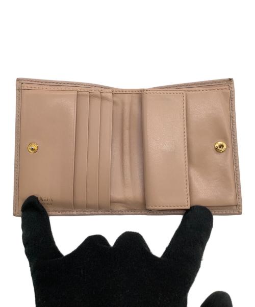 PRADA（プラダ）PRADA (プラダ) エピ 2つ折り財布 ベージュの古着・服飾アイテム