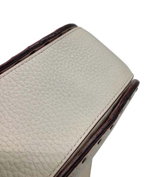 COACH（コーチ）COACH (コーチ) ペイジ27 ウィズ ボーダーリベット ショルダーバッグ アイボリーの古着・服飾アイテム