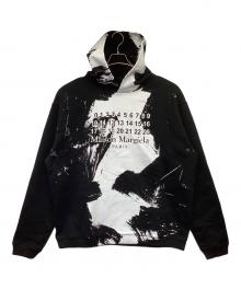 Maison Margiela（メゾンマルジェラ）の古着「ロゴペイントフーディ」｜ブラック