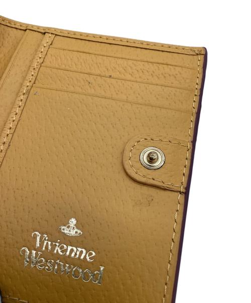 Vivienne Westwood（ヴィヴィアンウエストウッド）Vivienne Westwood (ヴィヴィアンウエストウッド) がま口財布 イエローの古着・服飾アイテム