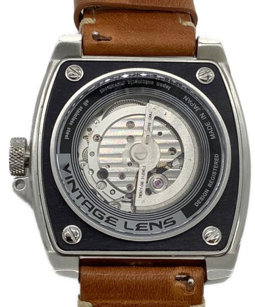 TACS（タックス）TACS (タックス) AVLII VINTAGE LENS AUTOMATIC II（ヴィンテージ レンズ オートマティック Ⅱ）自動巻き腕時計の古着・服飾アイテム
