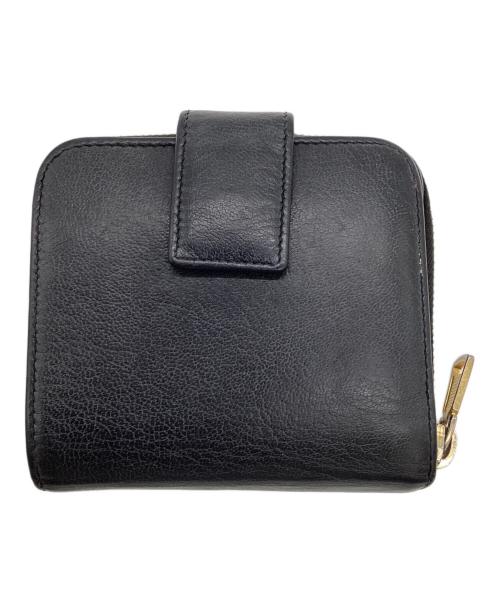 Yves Saint Laurent（イヴサンローラン）Yves Saint Laurent (イヴサンローラン) 2つ折り ラウンドジップウォレット ブラックの古着・服飾アイテム