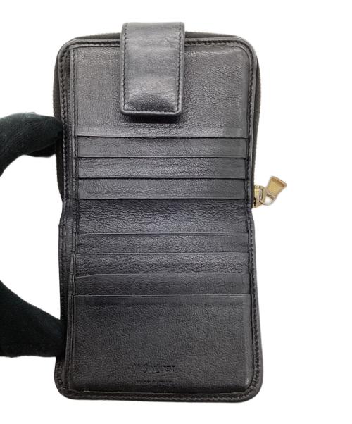 Yves Saint Laurent（イヴサンローラン）Yves Saint Laurent (イヴサンローラン) 2つ折り ラウンドジップウォレット ブラックの古着・服飾アイテム