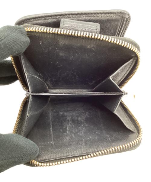 Yves Saint Laurent（イヴサンローラン）Yves Saint Laurent (イヴサンローラン) 2つ折り ラウンドジップウォレット ブラックの古着・服飾アイテム