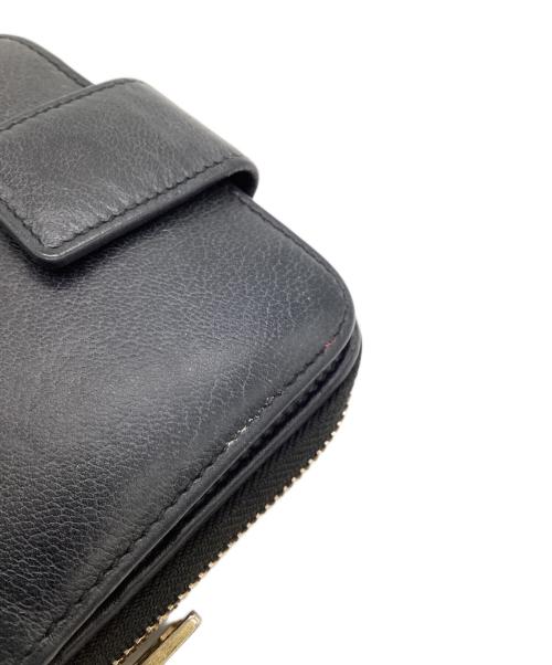 Yves Saint Laurent（イヴサンローラン）Yves Saint Laurent (イヴサンローラン) 2つ折り ラウンドジップウォレット ブラックの古着・服飾アイテム