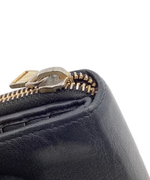 Yves Saint Laurent（イヴサンローラン）Yves Saint Laurent (イヴサンローラン) 2つ折り ラウンドジップウォレット ブラックの古着・服飾アイテム