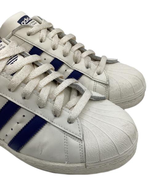adidas Originals（アディダスオリジナル）adidas Originals (アディダスオリジナル) SUPERSTAR 82（スーパースター 82） アイボリー×ブルー サイズ:26.5の古着・服飾アイテム