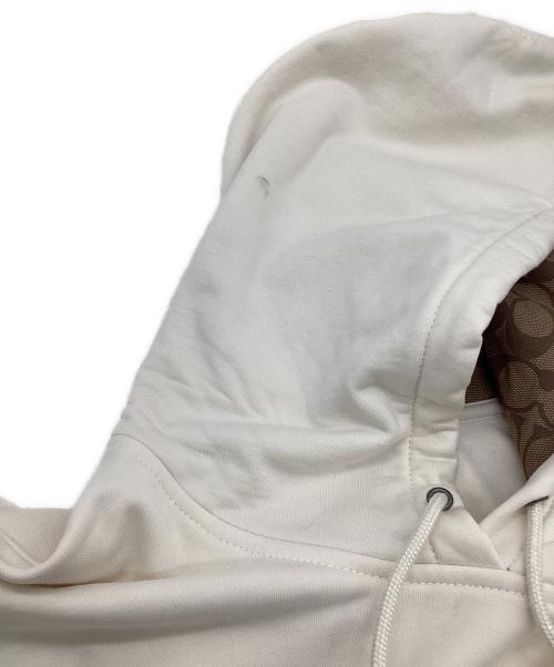 COACH（コーチ）COACH (コーチ) DISNEY (ディズニー) アイス スケート モチーフ フーディー ベージュ サイズ:Lの古着・服飾アイテム