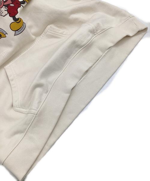 COACH（コーチ）COACH (コーチ) DISNEY (ディズニー) アイス スケート モチーフ フーディー ベージュ サイズ:Lの古着・服飾アイテム