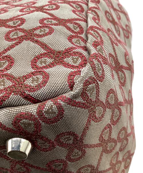 ANYA HINDMARCH（アニヤ・ハインドマーチ）ANYA HINDMARCH (アニヤ・ハインドマーチ) ハンドバッグ ベージュ×レッドの古着・服飾アイテム