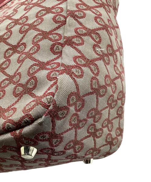 ANYA HINDMARCH（アニヤ・ハインドマーチ）ANYA HINDMARCH (アニヤ・ハインドマーチ) ハンドバッグ ベージュ×レッドの古着・服飾アイテム