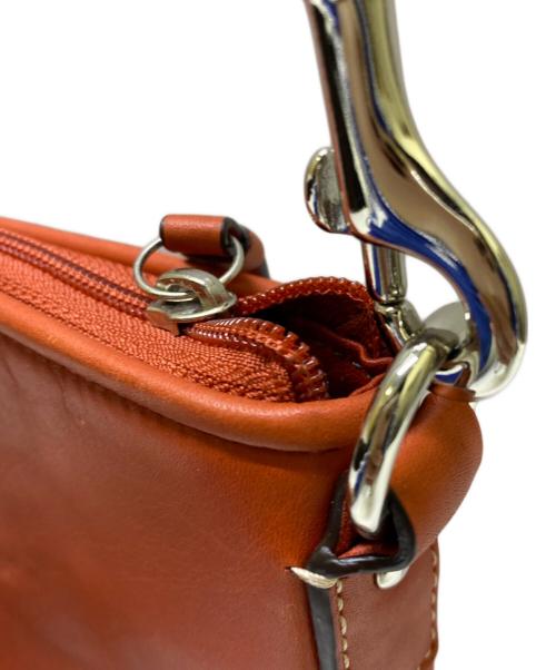 COACH（コーチ）COACH (コーチ) レザープリテッドスウィングバッグ オレンジの古着・服飾アイテム
