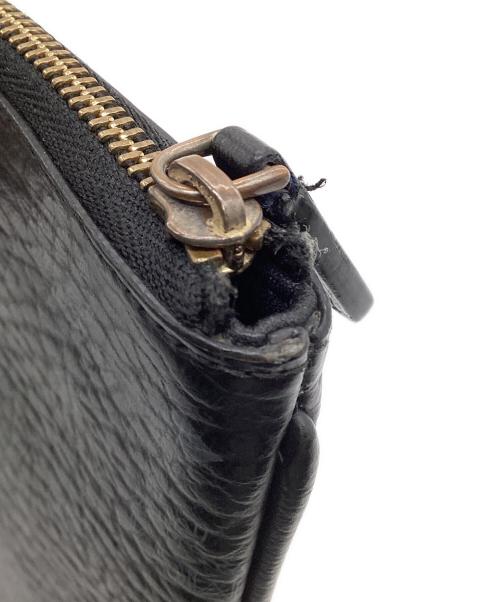 MCM（エムシーエム）MCM (エムシーエム) クラッチバッグ ブラック×オレンジの古着・服飾アイテム