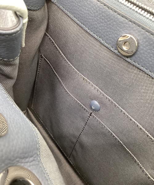 COLE HAAN（コールハーン）COLE HAAN (コールハーン) グランド アンビション スモール バケット バッグ ブルー×ネイビーの古着・服飾アイテム