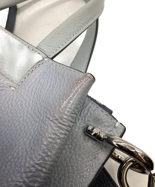 COLE HAAN（コールハーン）COLE HAAN (コールハーン) グランド アンビション スモール バケット バッグ ブルー×ネイビーの古着・服飾アイテム