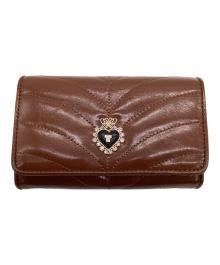 ANNA SUI（アナスイ）の古着「ポワロ 2つ折り財布」｜ブラウン