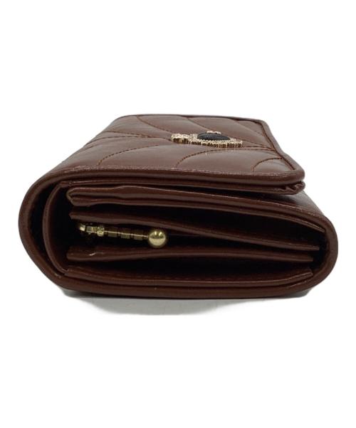 ANNA SUI（アナスイ）ANNA SUI (アナスイ) ポワロ 2つ折り財布 ブラウンの古着・服飾アイテム
