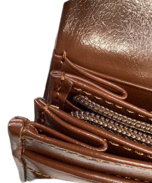 ANNA SUI（アナスイ）ANNA SUI (アナスイ) ポワロ 2つ折り財布 ブラウンの古着・服飾アイテム