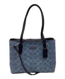 COACH（コーチ）の古着「シグネチャー トートバッグ」｜スカイブルー×ブラック