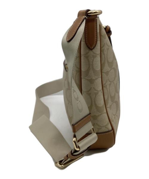 COACH（コーチ）COACH (コーチ) エリー ファイル バッグ シグネチャー キャンバス ストライプ アイボリーの古着・服飾アイテム