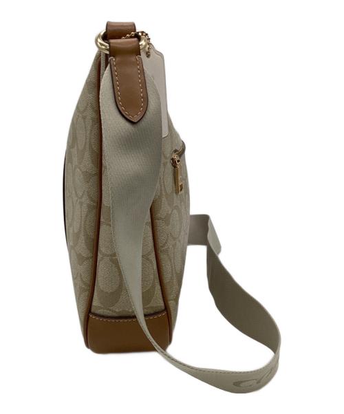 COACH（コーチ）COACH (コーチ) エリー ファイル バッグ シグネチャー キャンバス ストライプ アイボリーの古着・服飾アイテム