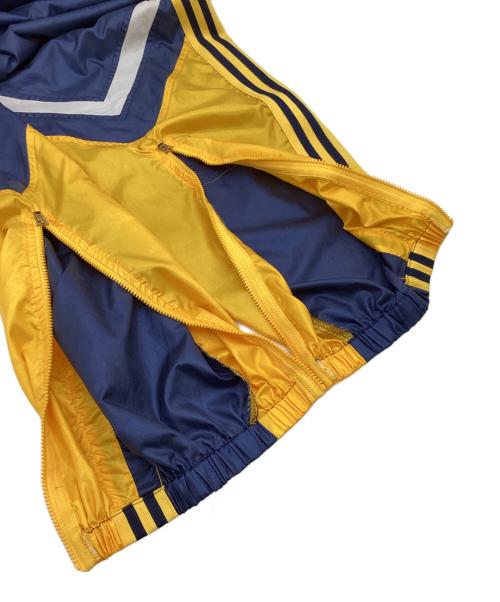 adidas（アディダス）adidas (アディダス) ナイロン トラック セットアップ ネイビー×イエロー サイズ:M-Lの古着・服飾アイテム