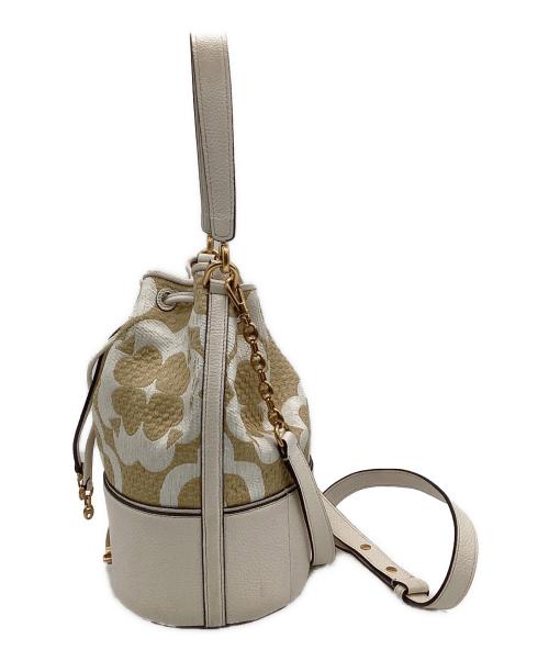 Kate Spade（ケイトスペード）Kate Spade (ケイトスペード) スペードフラワーモノグラムラフィアグラマシーミディアムバケットバッグ ベージュの古着・服飾アイテム