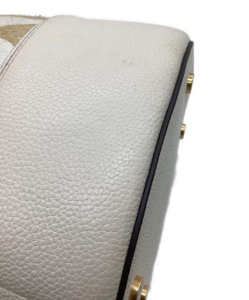 Kate Spade（ケイトスペード）Kate Spade (ケイトスペード) スペードフラワーモノグラムラフィアグラマシーミディアムバケットバッグ ベージュの古着・服飾アイテム
