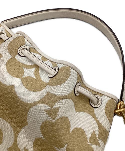 Kate Spade（ケイトスペード）Kate Spade (ケイトスペード) スペードフラワーモノグラムラフィアグラマシーミディアムバケットバッグ ベージュの古着・服飾アイテム