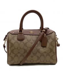 COACH（コーチ）の古着「シグネチャー 2WAYショルダーバッグ」｜ベージュ×ブラウン