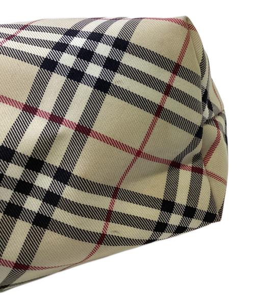 BURBERRY（バーバリー）BURBERRY (バーバリー) 巾着ハンドバッグ レッド×ベージュの古着・服飾アイテム