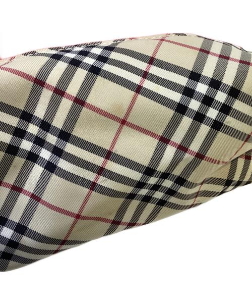 BURBERRY（バーバリー）BURBERRY (バーバリー) 巾着ハンドバッグ レッド×ベージュの古着・服飾アイテム