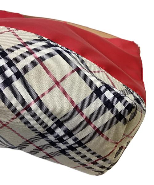 BURBERRY（バーバリー）BURBERRY (バーバリー) 巾着ハンドバッグ レッド×ベージュの古着・服飾アイテム