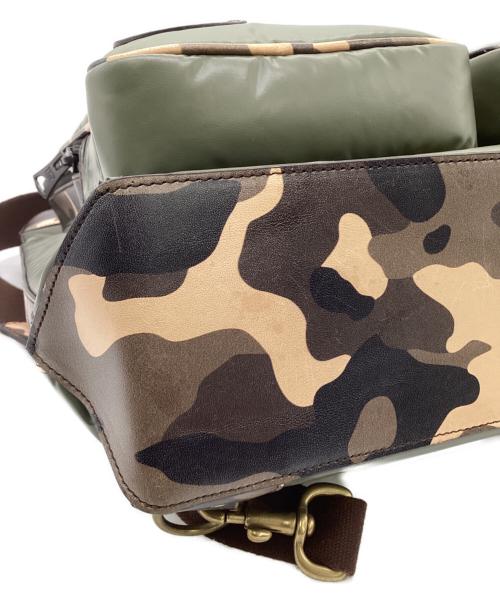 HUNTING WORLD（ハンティングワールド）HUNTING WORLD (ハンティングワールド) BATTUE CAMO（バチューカモ）2WAYヘルメットバッグ グリーン×ベージュの古着・服飾アイテム