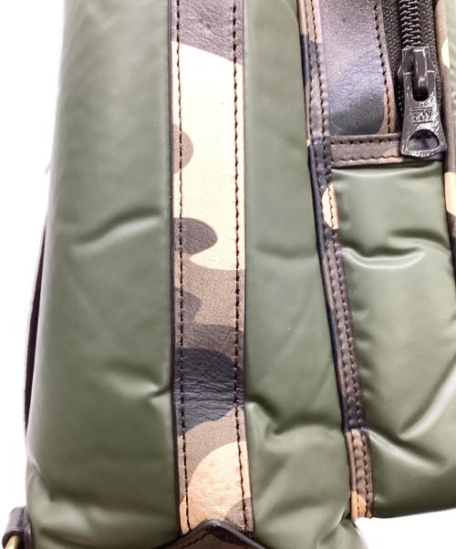 HUNTING WORLD（ハンティングワールド）HUNTING WORLD (ハンティングワールド) BATTUE CAMO（バチューカモ）2WAYヘルメットバッグ グリーン×ベージュの古着・服飾アイテム
