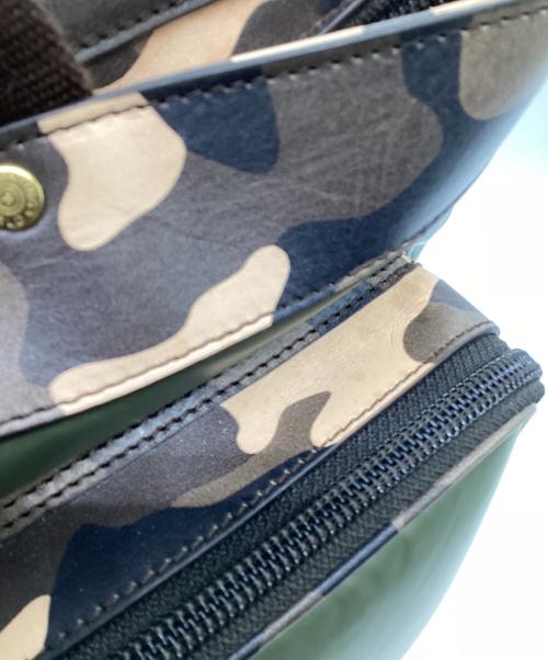 HUNTING WORLD（ハンティングワールド）HUNTING WORLD (ハンティングワールド) BATTUE CAMO（バチューカモ）2WAYヘルメットバッグ グリーン×ベージュの古着・服飾アイテム