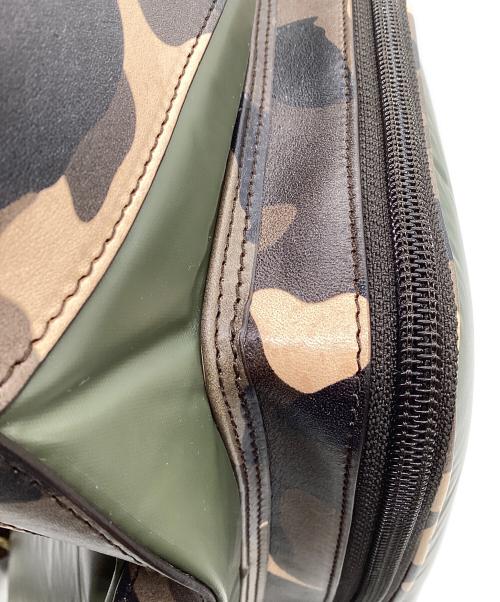 HUNTING WORLD（ハンティングワールド）HUNTING WORLD (ハンティングワールド) BATTUE CAMO（バチューカモ）2WAYヘルメットバッグ グリーン×ベージュの古着・服飾アイテム