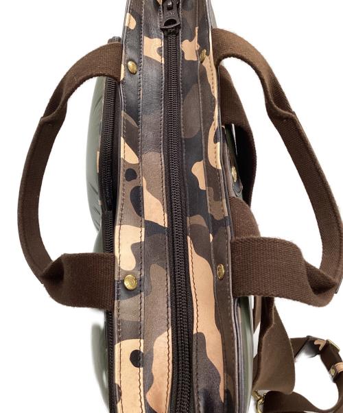 HUNTING WORLD（ハンティングワールド）HUNTING WORLD (ハンティングワールド) BATTUE CAMO（バチューカモ）2WAYヘルメットバッグ グリーン×ベージュの古着・服飾アイテム