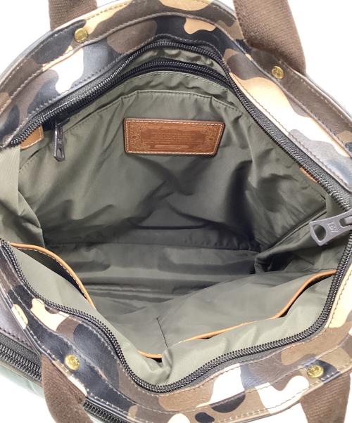 HUNTING WORLD（ハンティングワールド）HUNTING WORLD (ハンティングワールド) BATTUE CAMO（バチューカモ）2WAYヘルメットバッグ グリーン×ベージュの古着・服飾アイテム