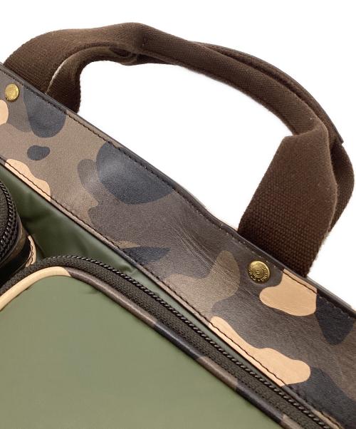 HUNTING WORLD（ハンティングワールド）HUNTING WORLD (ハンティングワールド) BATTUE CAMO（バチューカモ）2WAYヘルメットバッグ グリーン×ベージュの古着・服飾アイテム