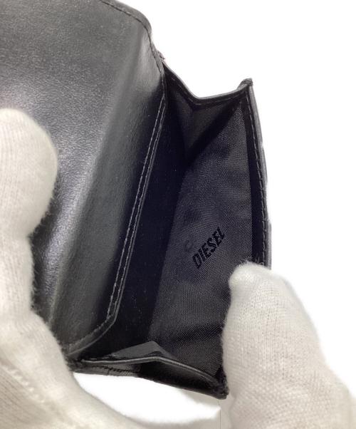 DIESEL（ディーゼル）DIESEL (ディーゼル) 1DR TRI FOLD COIN XS Ⅱ3つ折り財布 ブラックの古着・服飾アイテム