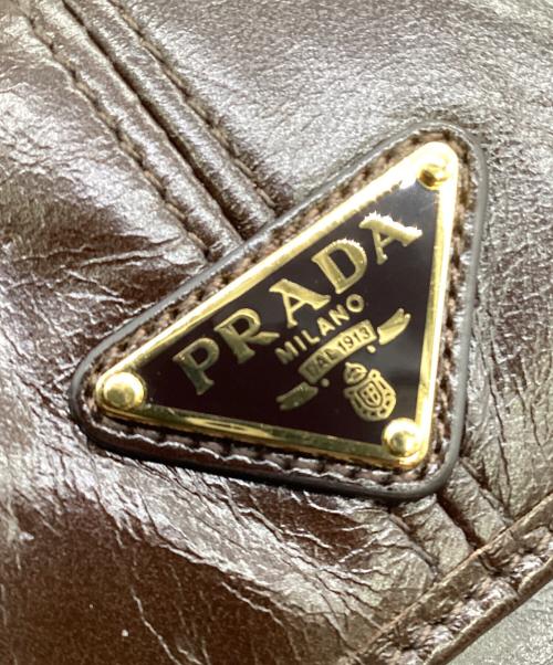 PRADA（プラダ）PRADA (プラダ) ソフトルックスレザー 3つ折り財布 ブラウンの古着・服飾アイテム